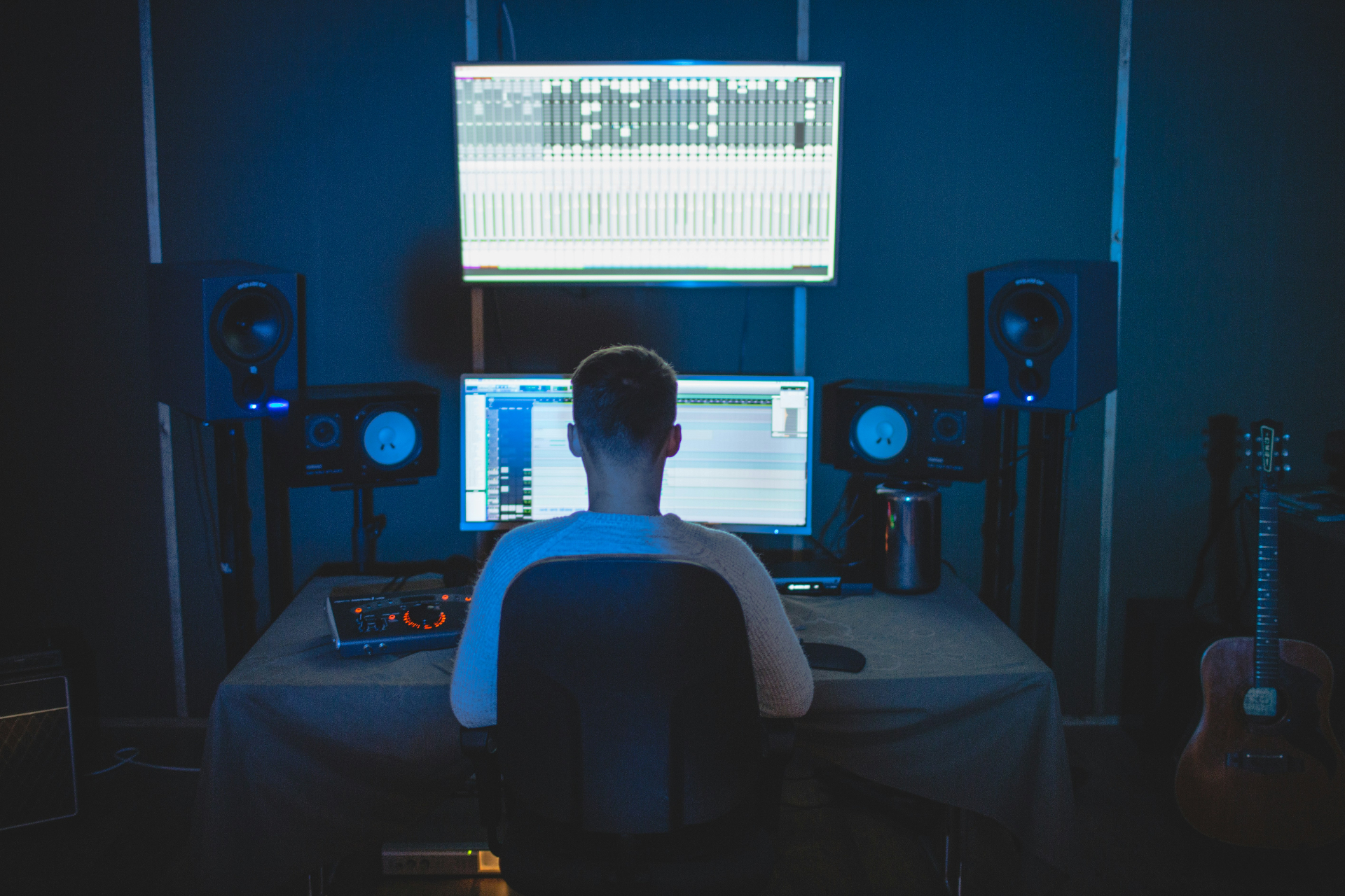 Producer at mixing console